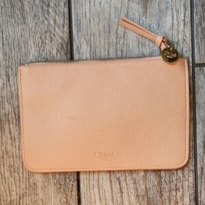 Chloè Parfum Small Zipper Cosmetics Bag Peach Color with gold zipper pull charm.